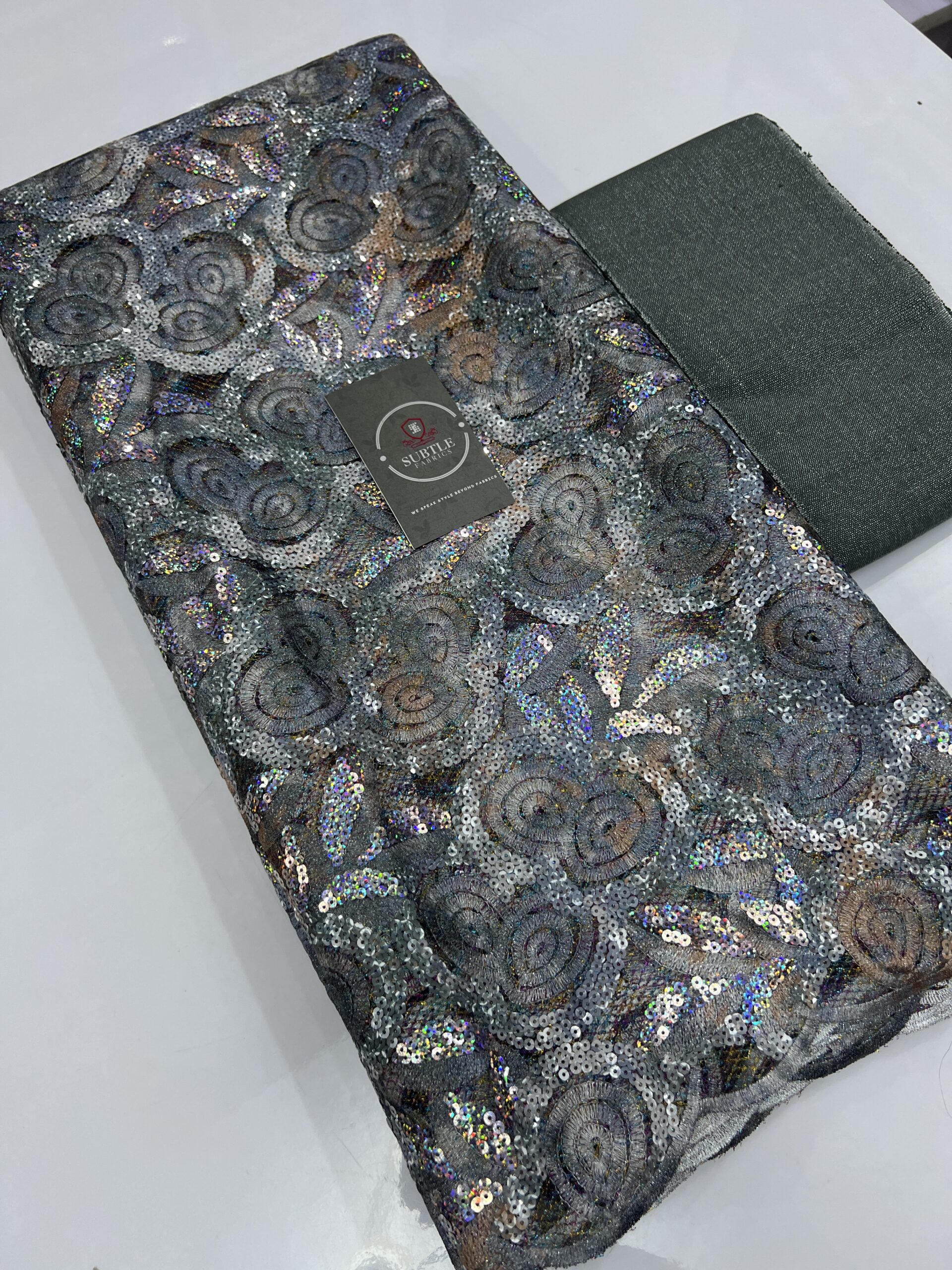 Luxury Statement Net Sequence Lace Fabric 5549 4 Luxury net sequence lace fabric with bold embroidered patterns and high-shine embellishments for aso ebi
