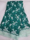 Luxury Emerald Green 3D Floral Net Lace Fabric Z112 1 WhatsApp Image 2026 07 02 at 2.14.49 PM